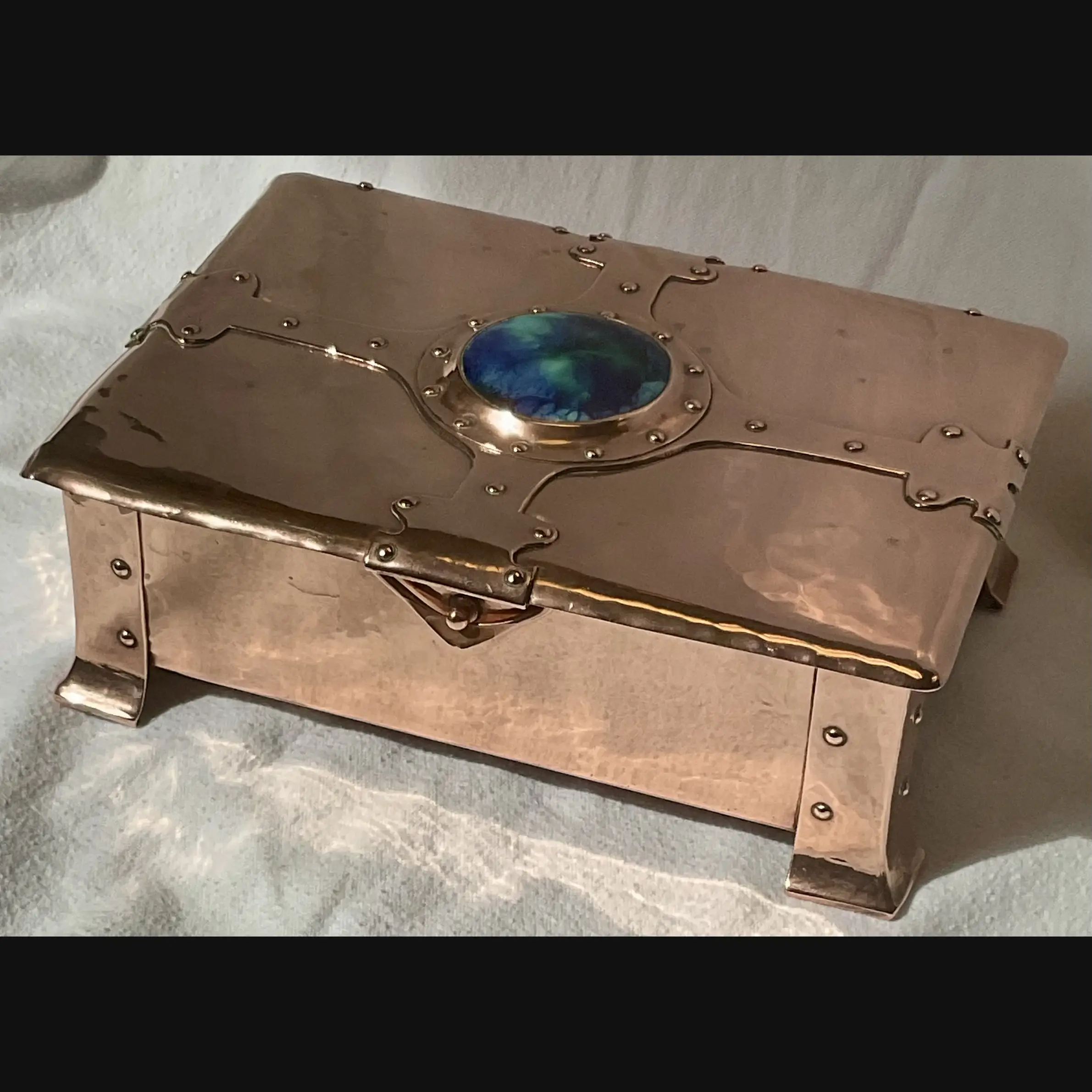a e jones large arts and crafts copper strap topped casket with ruskin cabochon and  clasp