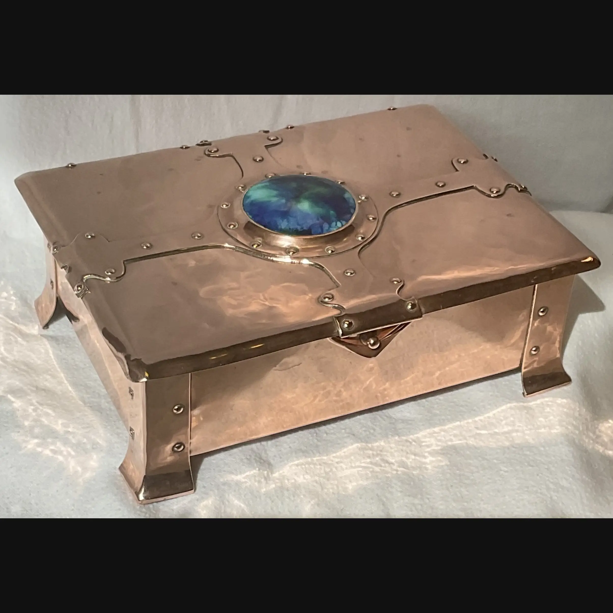 a e jones large arts and crafts copper strap topped casket with ruskin cabochon and  clasp