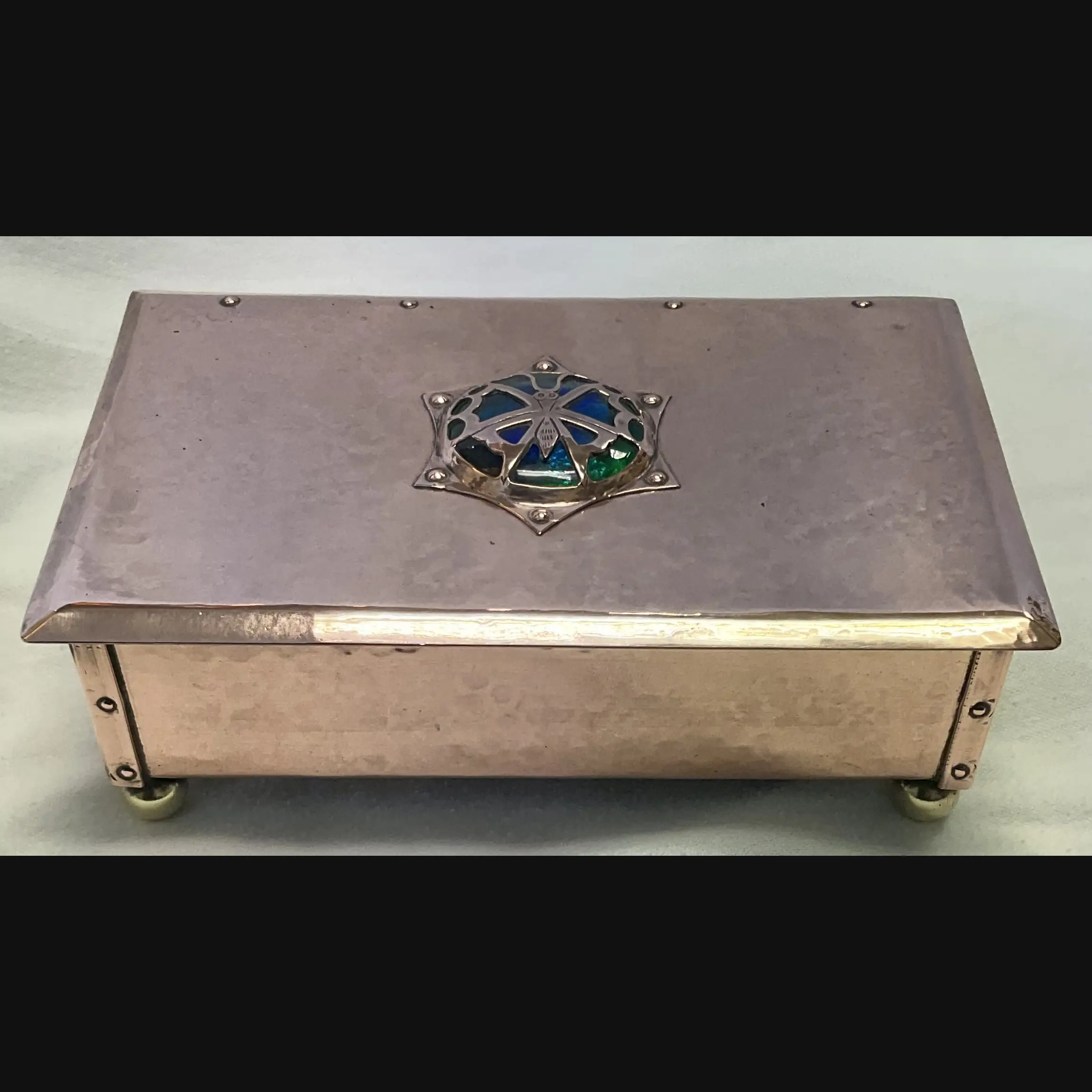 cambray ware best and lloyd arts and crafts copper casket with butterfly covered enamelled cabochon