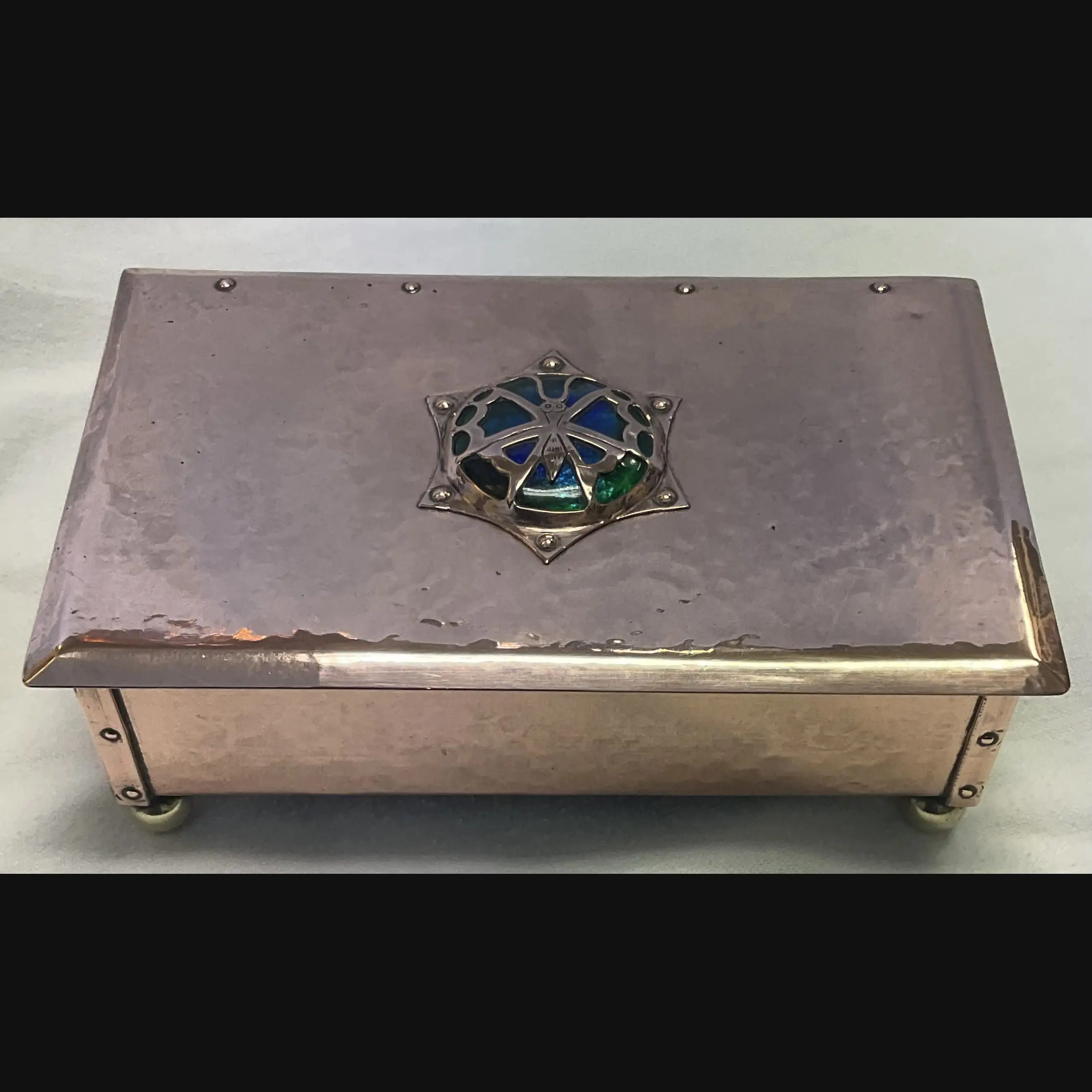 cambray ware best and lloyd arts and crafts copper casket with butterfly covered enamelled cabochon
