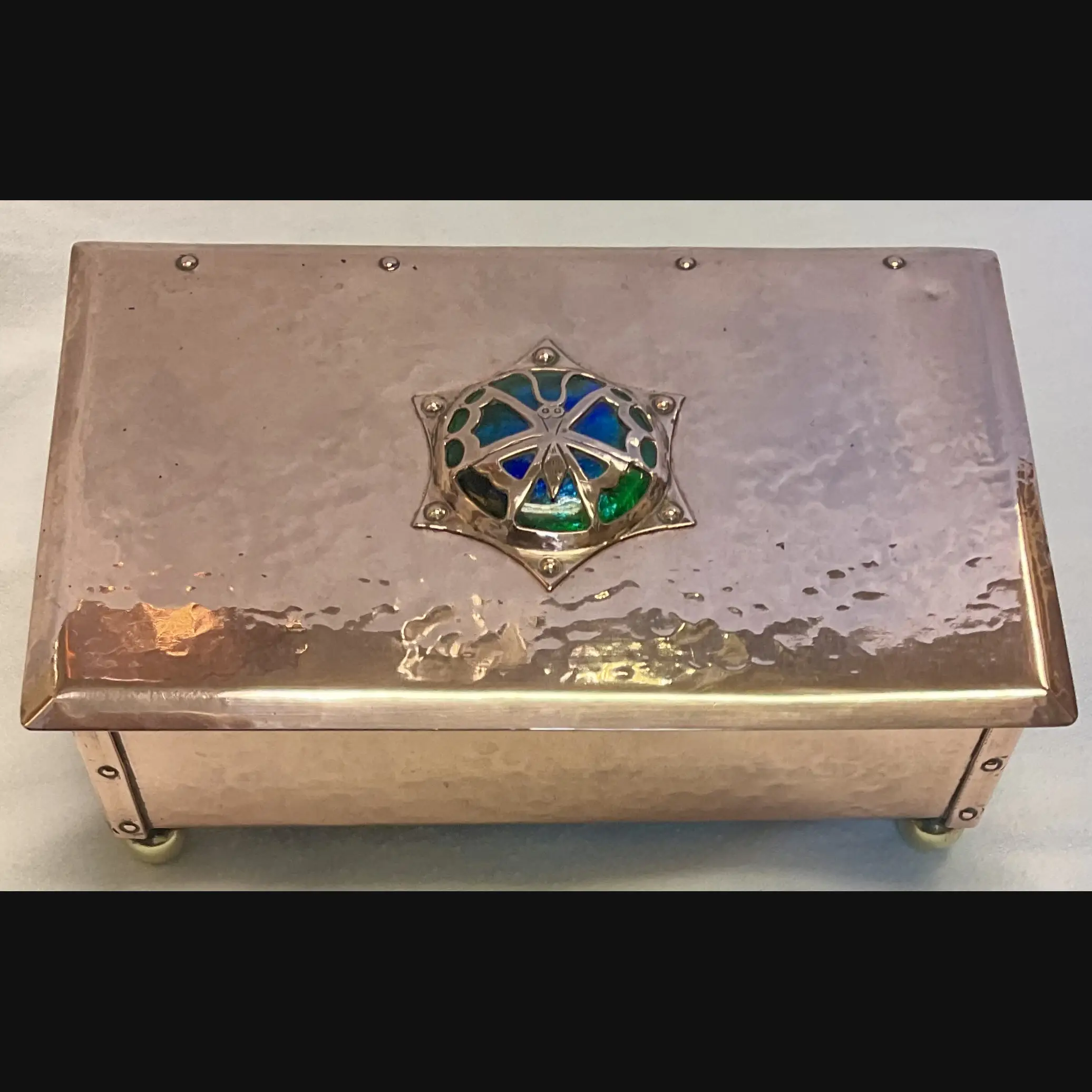 cambray ware best and lloyd arts and crafts copper casket with butterfly covered enamelled cabochon