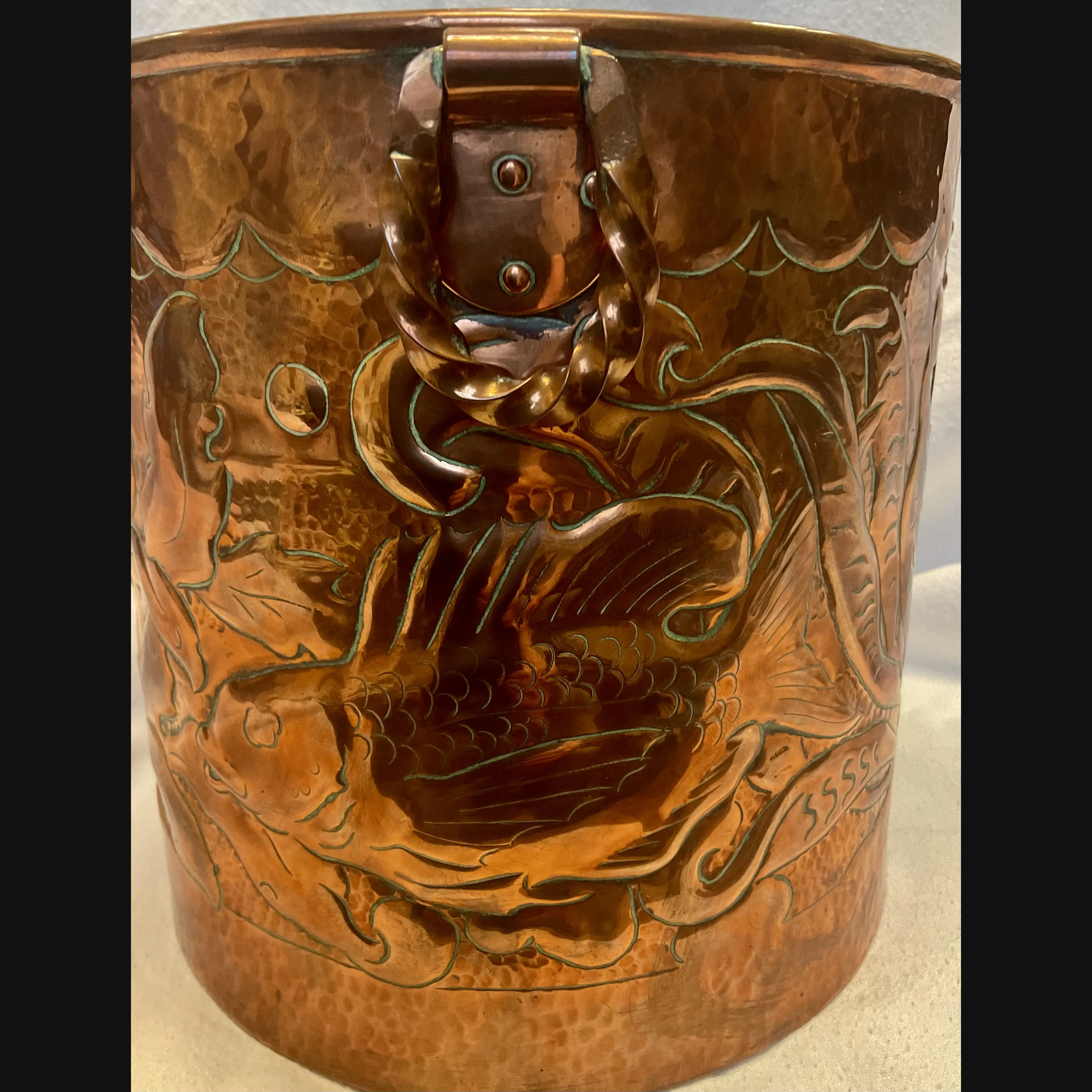 large newlyn arts and crafts copper jardiniere fish and seaweed with double twist loop handles