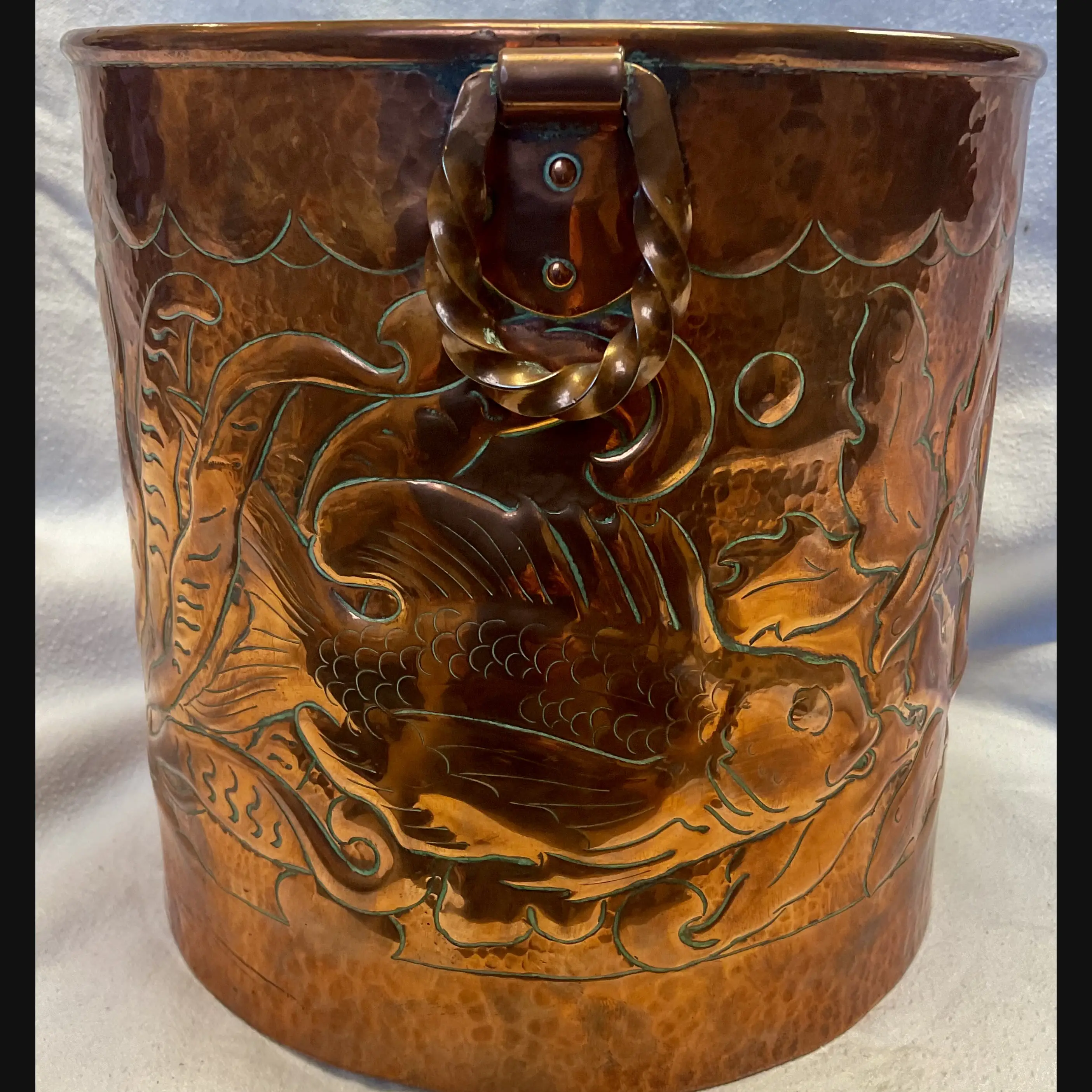 large newlyn arts and crafts copper jardiniere fish and seaweed with double twist loop handles