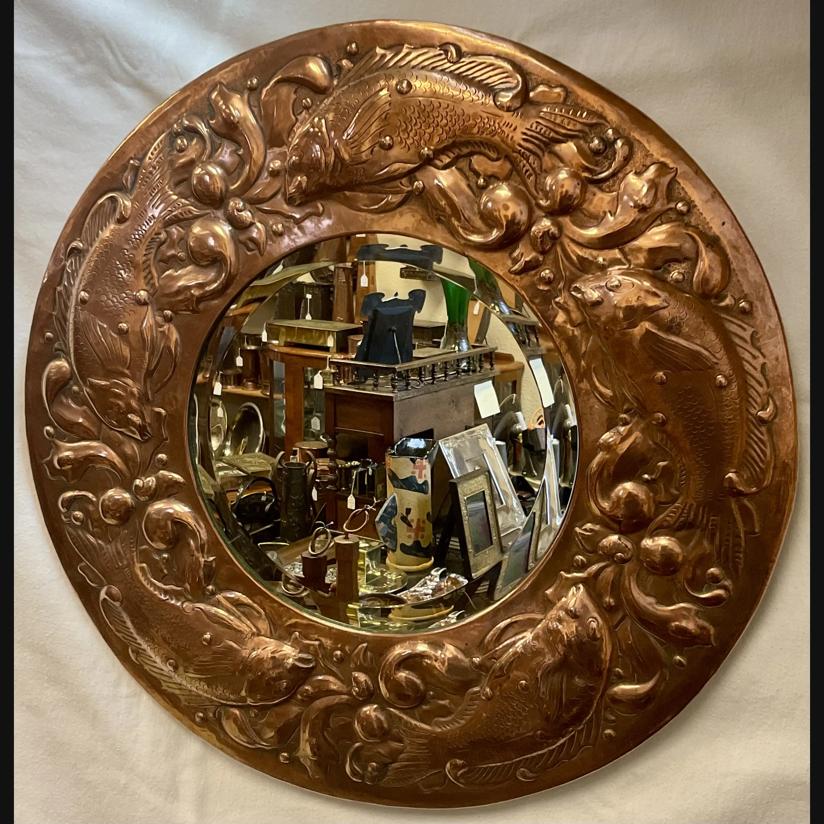 large newlyn circular copper hall mirror with large fish and seaweed bevelled mirror plate pre 1906