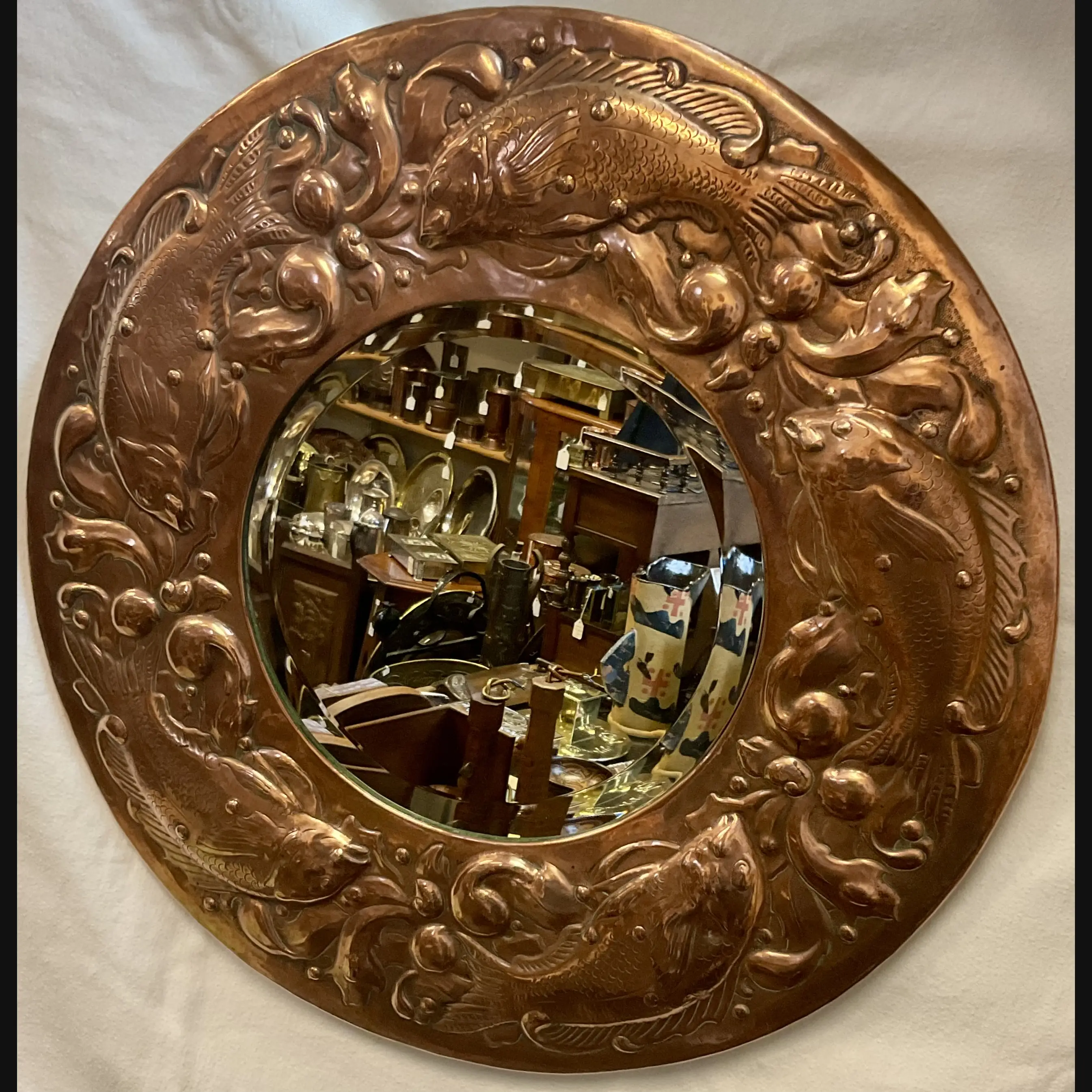 large newlyn circular copper hall mirror with large fish and seaweed bevelled mirror plate pre 1906