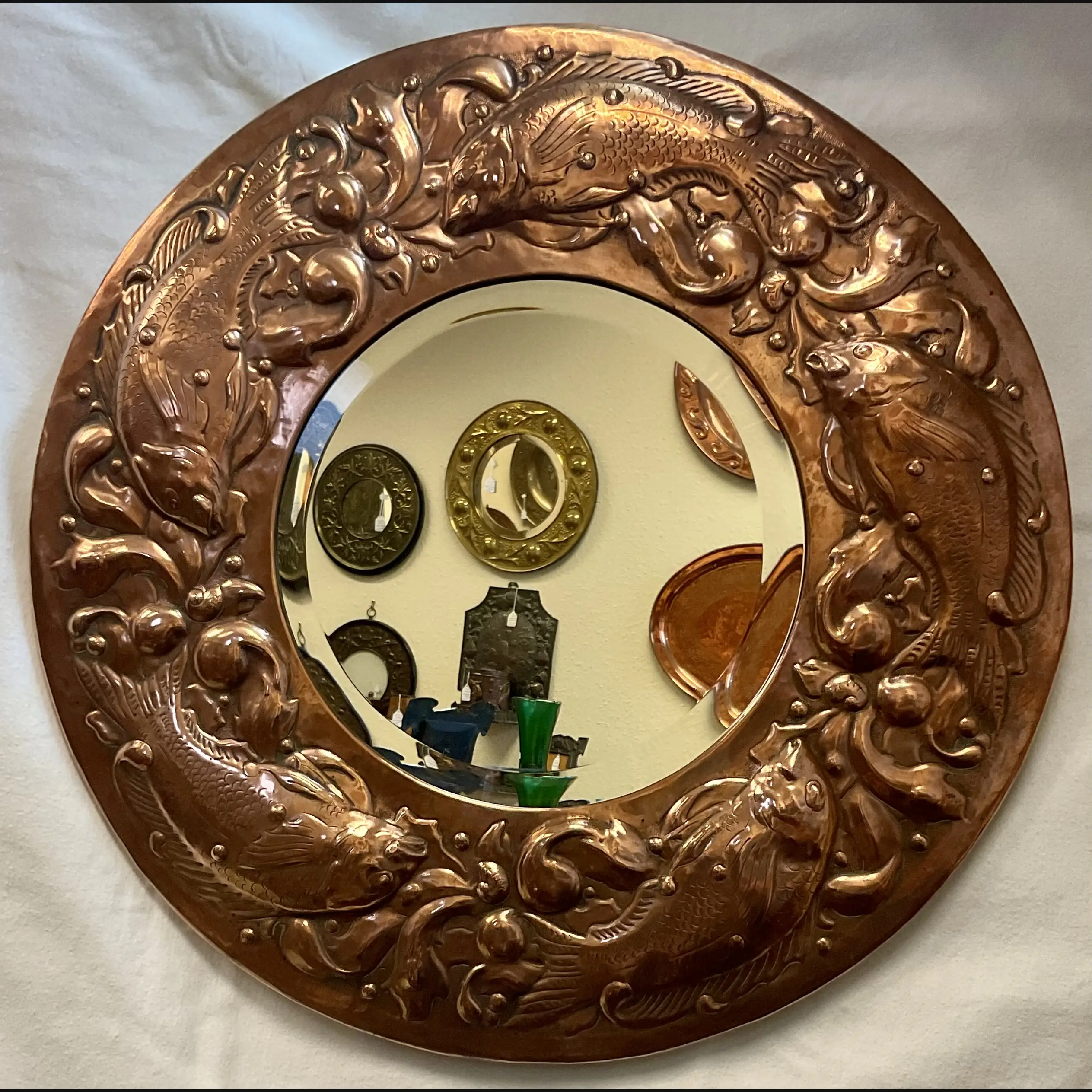 large newlyn circular copper hall mirror with large fish and seaweed bevelled mirror plate pre 1906