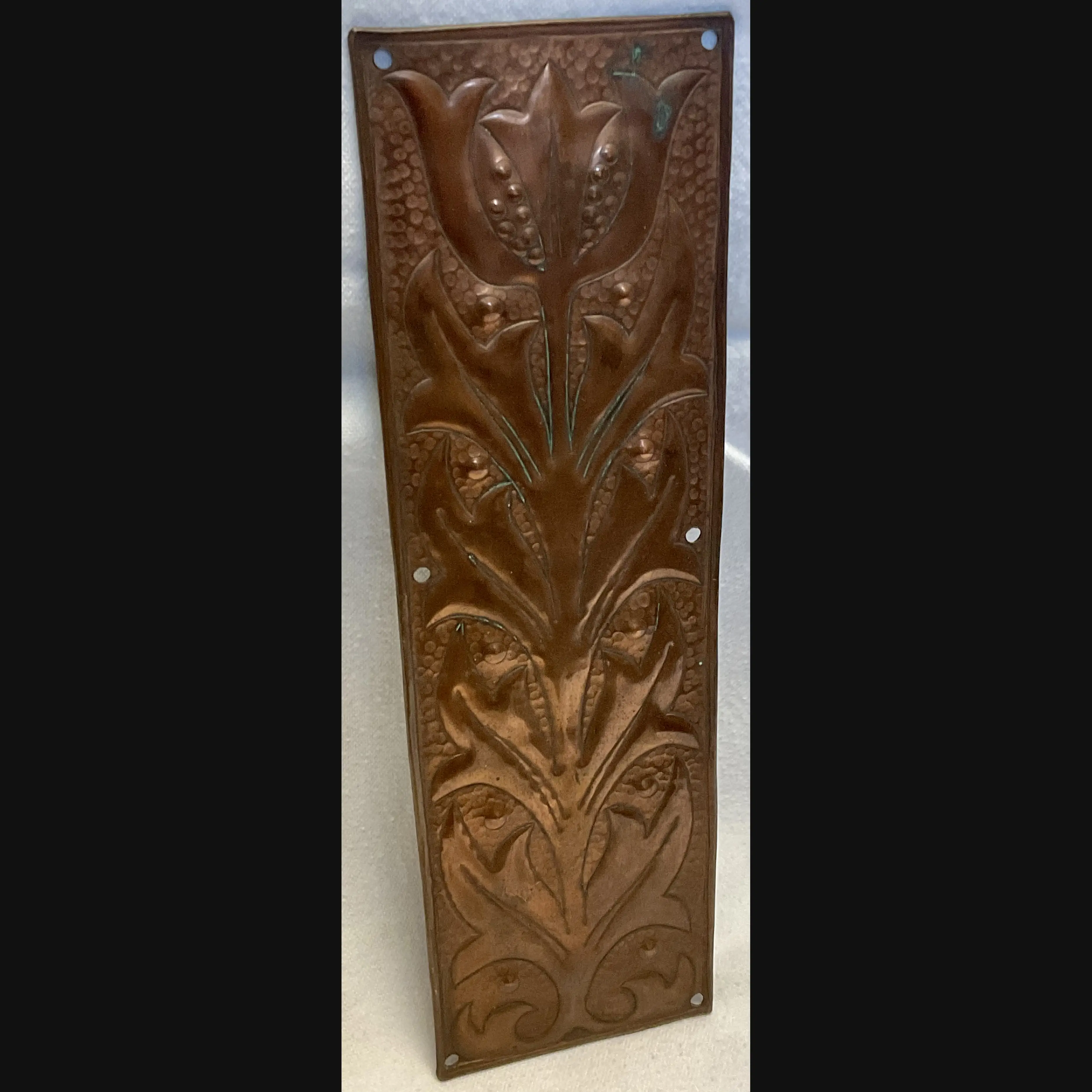 keswick school of industrial art copper arts and crafts door finger plate with stylised flower head c1900