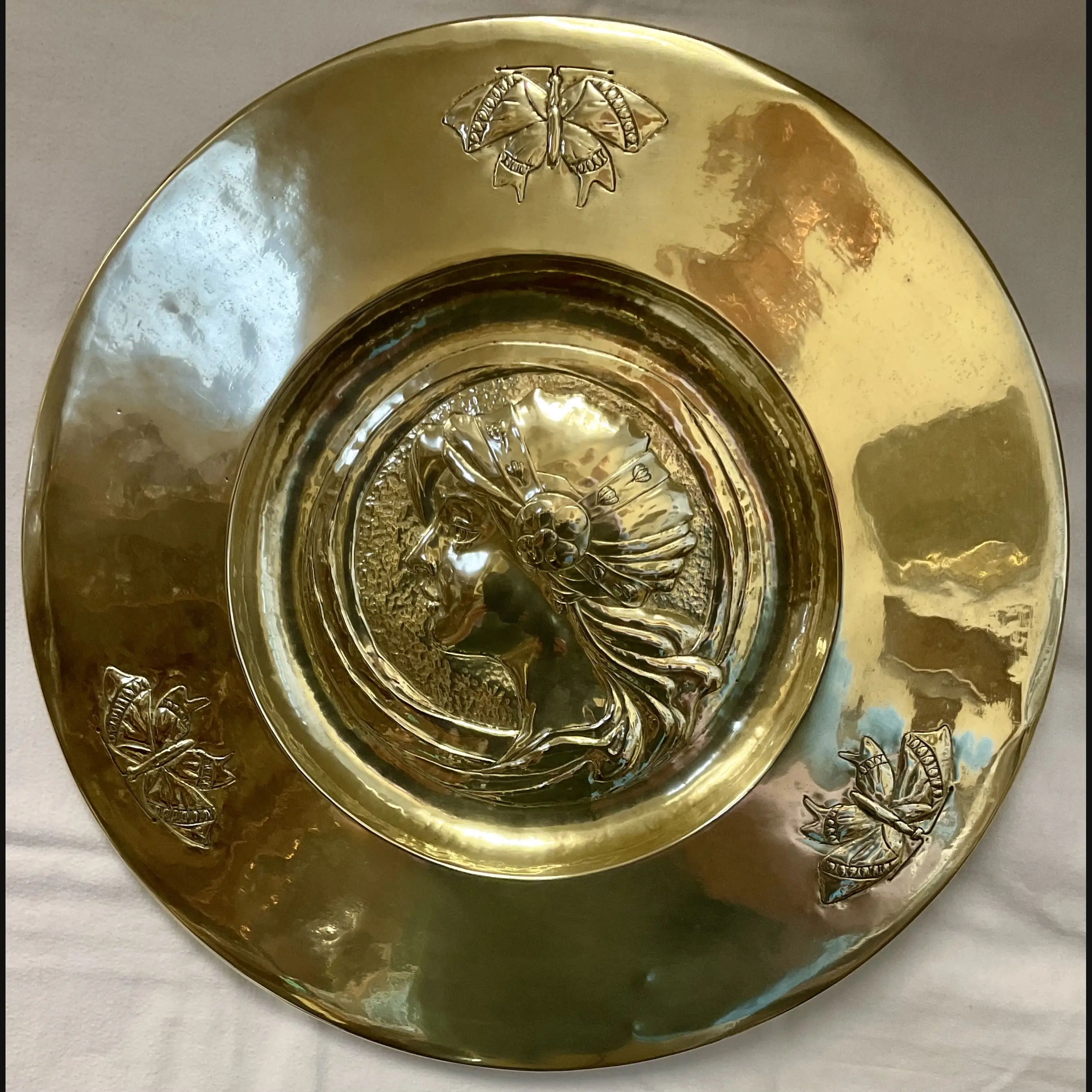 glasgow school scottish arts and crafts glasgow girls brass wall charger with young maiden and butterflies c1900