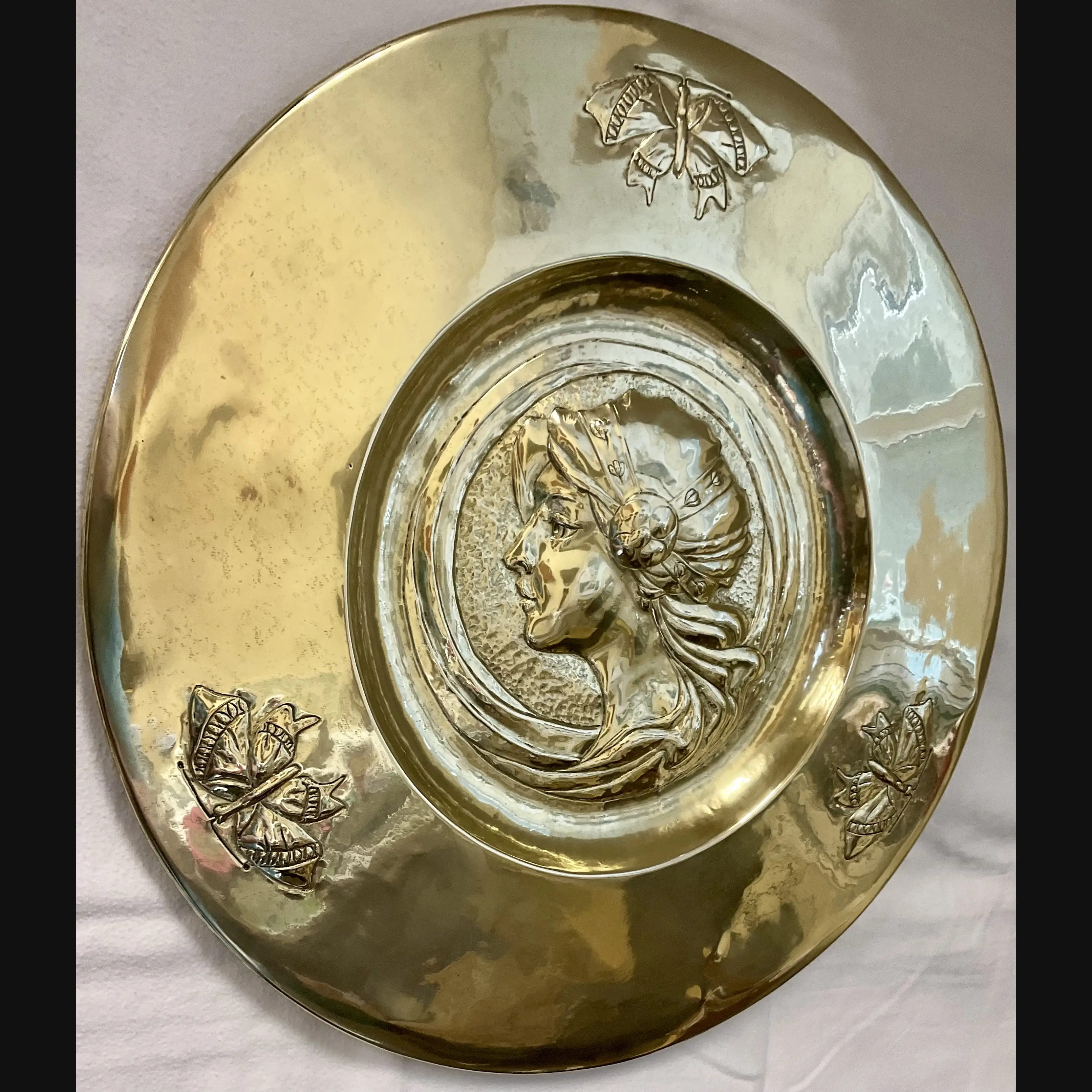 glasgow school scottish arts and crafts glasgow girls brass wall charger with young maiden and butterflies c1900