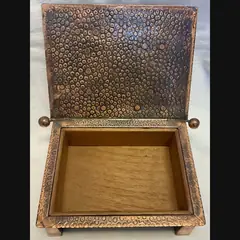 j f pool hayle copper strap topped casket with tapered feet in their secessionist manner
