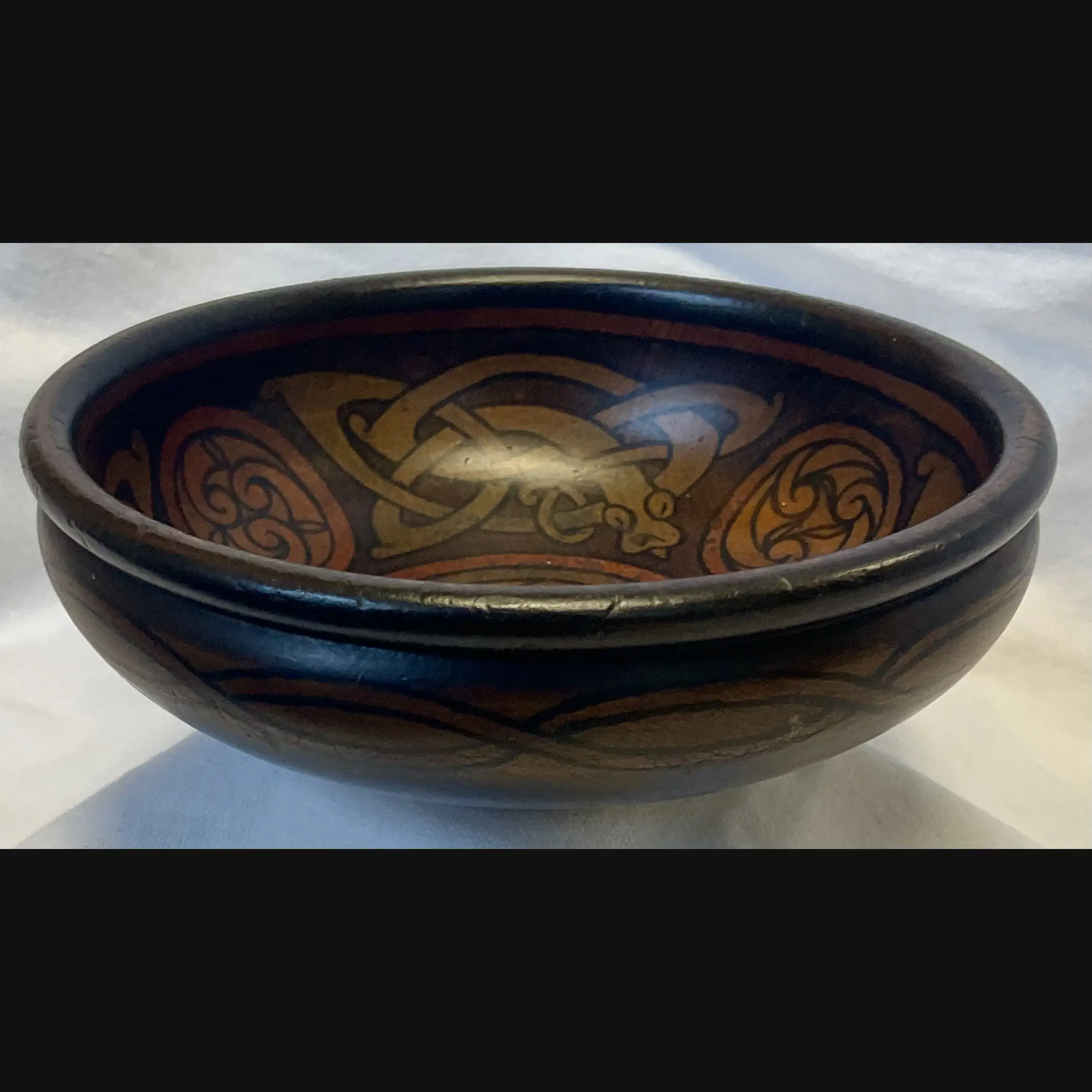 irish arts and crafts celtic mythical beasts pen work bowl in the manner of the belfast school eva mackay c1900