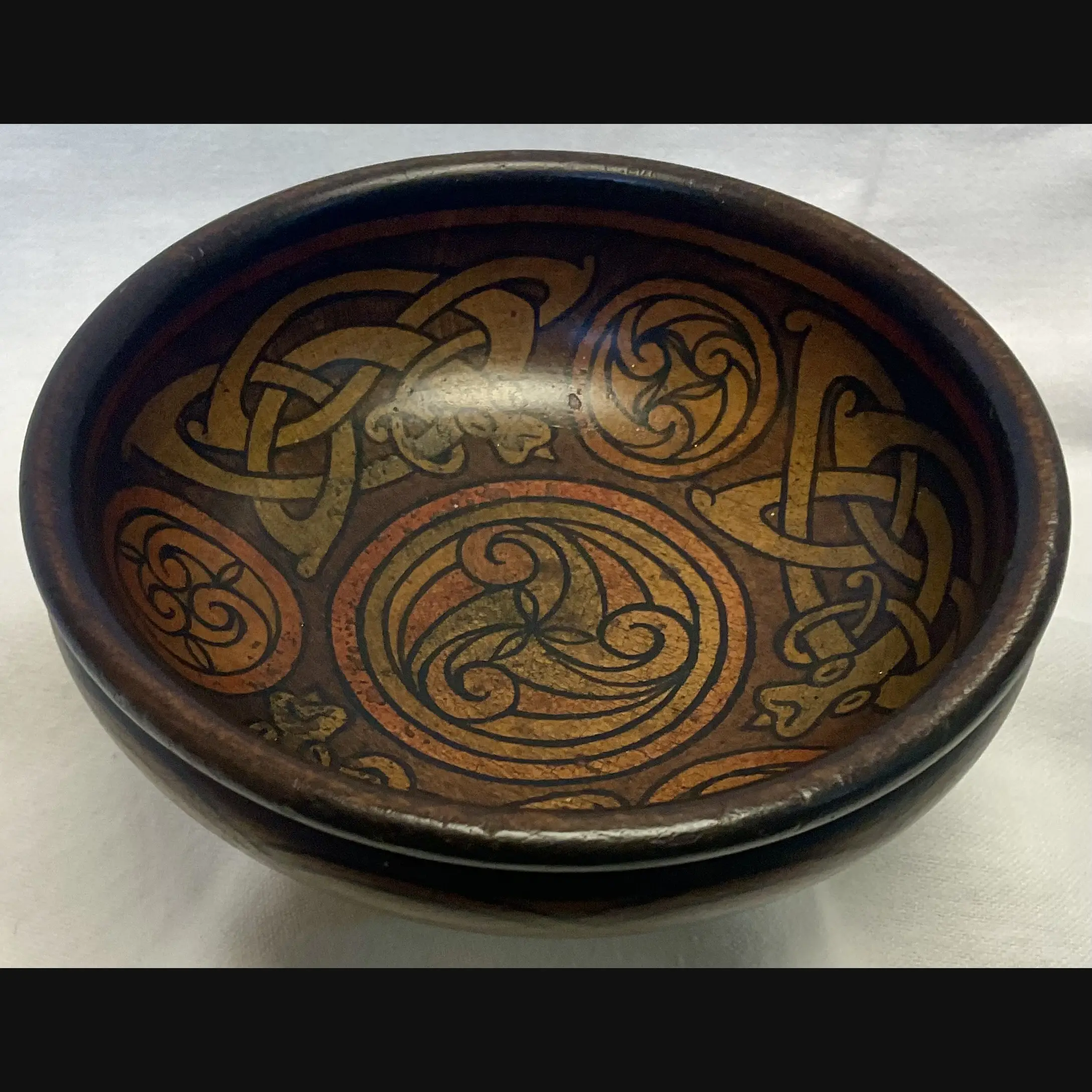irish arts and crafts celtic mythical beasts pen work bowl in the manner of the belfast school eva mackay c1900