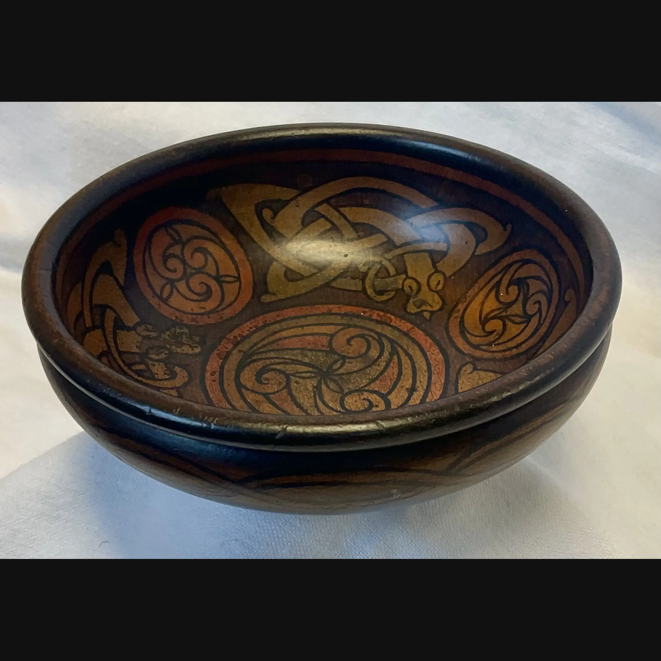 irish arts and crafts celtic mythical beasts pen work bowl in the manner of the belfast school eva mackay c1900