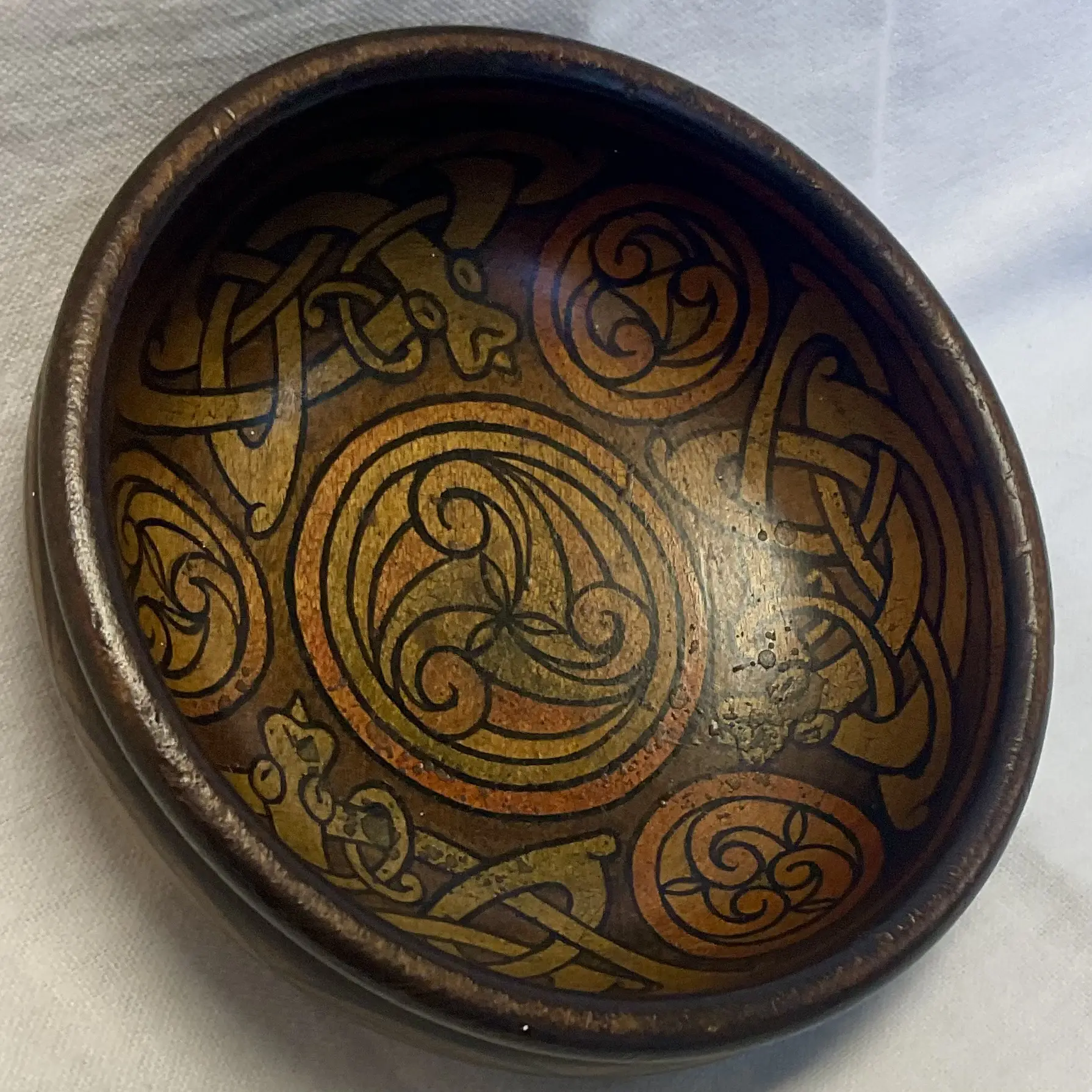 irish arts and crafts celtic mythical beasts pen work bowl in the manner of the belfast school eva mackay c1900