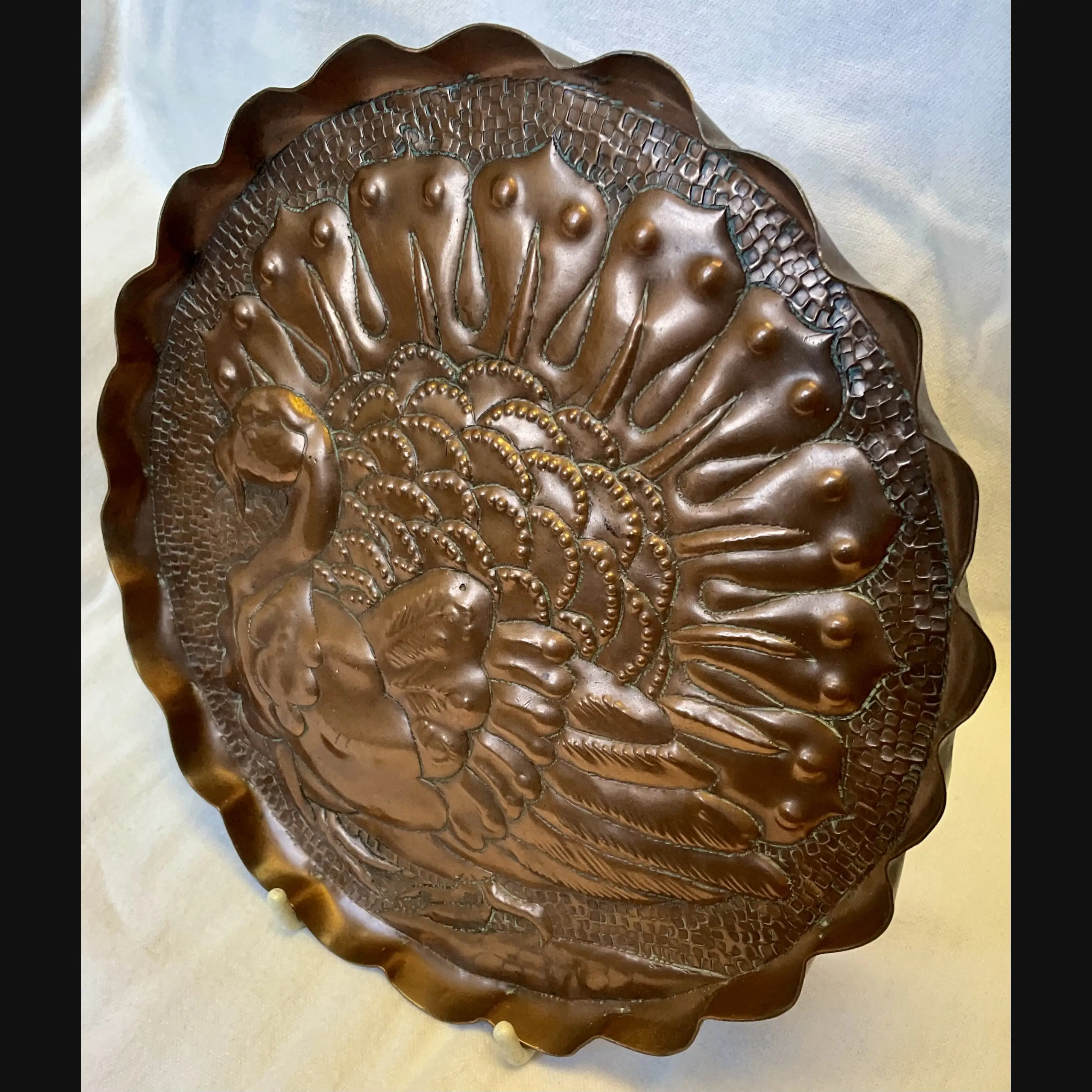 newton industrial class arts and crafts copper card tray decorated with a turkey