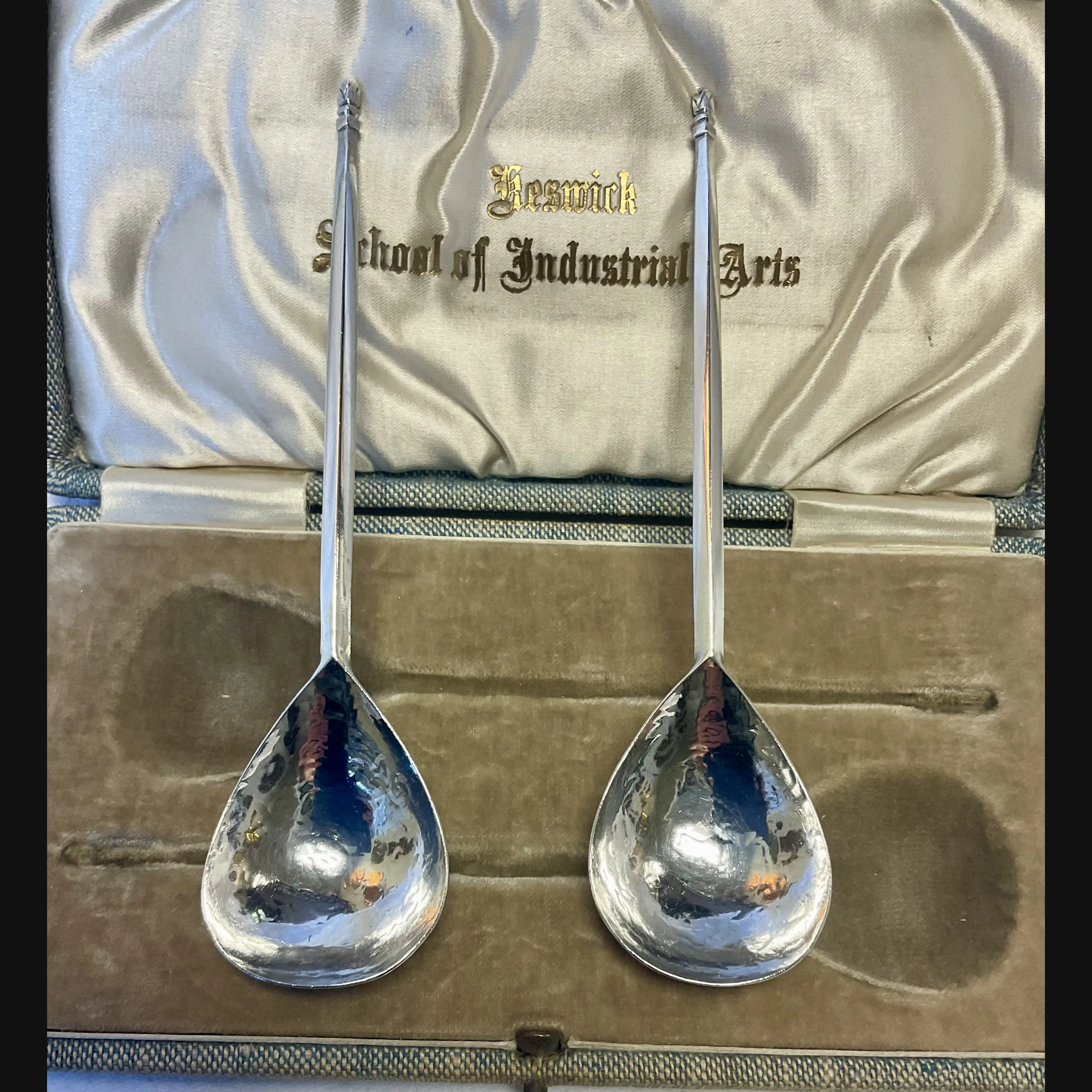 keswick school of industrial art ksia arts and crafts cased pair of silver serving spoons original silk lined fitted box