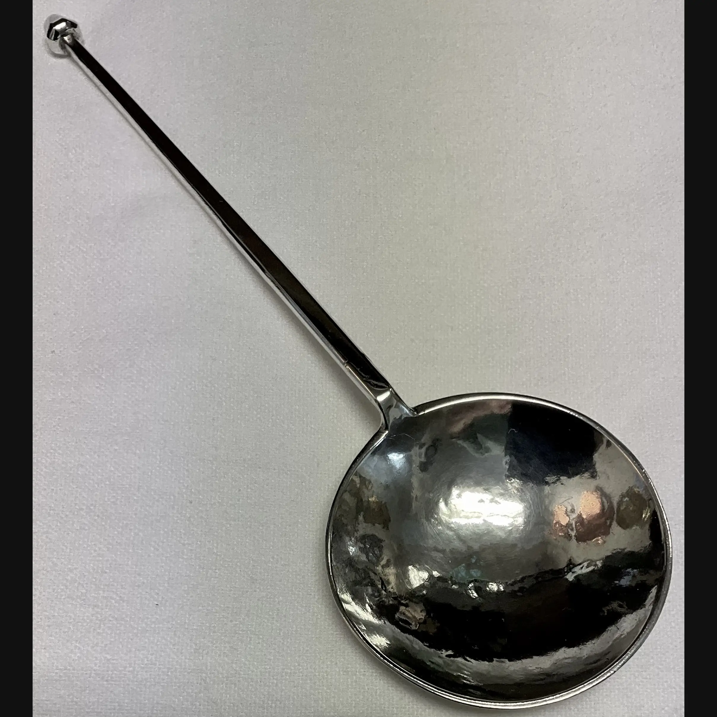keswick school of industrial art ksia silver spoon with large flattened bowl with hammered terminal top birmingham 1898