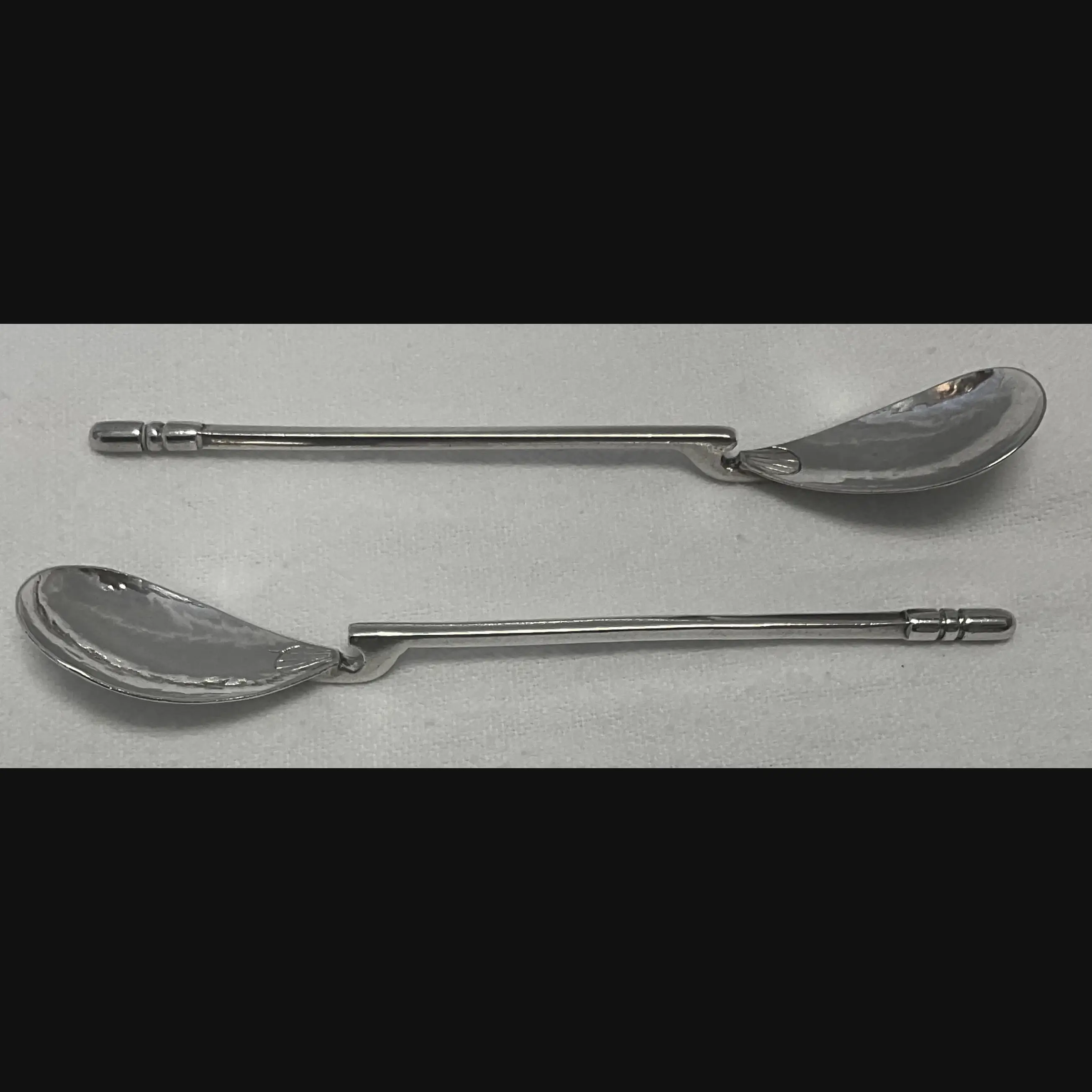 keswick school of industrial art ksia arts and crafts pair of silver roman spoons