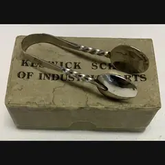 keswick school of industrial art ksia arts and crafts early boxed pair of steel sugar tongs