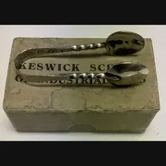 keswick school of industrial art ksia arts and crafts early boxed pair of steel sugar tongs
